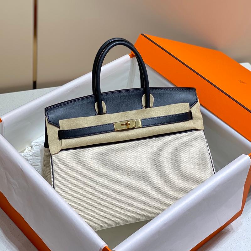 Hermes Birkin35 fabric with leather black gold buckle.